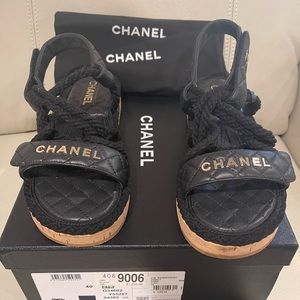 CHANEL
Cord Lambskin Quilted Logo Sandals